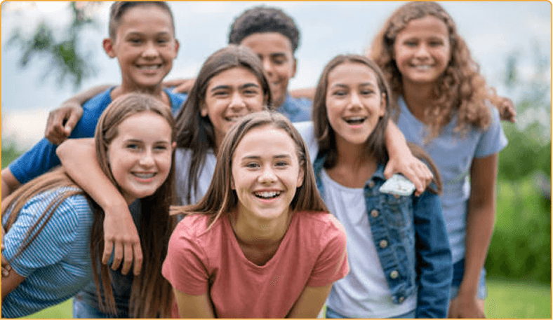 Group of younger teens outdoors